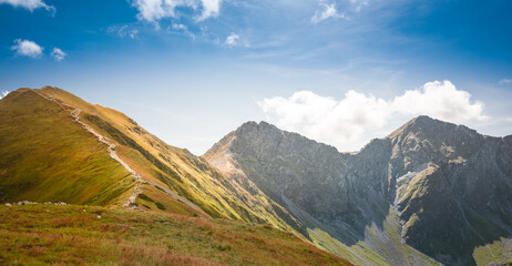 Path to Wolowiec and Rohac Ostry in the background - breathtaking peaks in Slovakian Tatra Mountains - obrazy, fototapety, plakaty