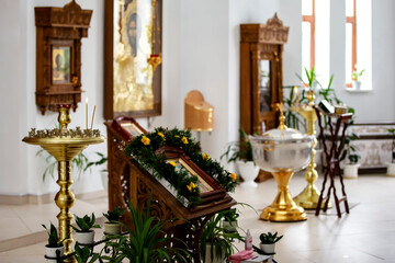 The interior of the church. Altar and church candles