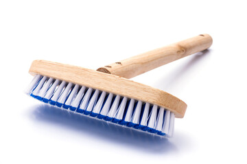 Floor brush with wooden handle On a white background