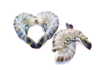 Fresh prawns placed in heart shape, isolated on a white background.