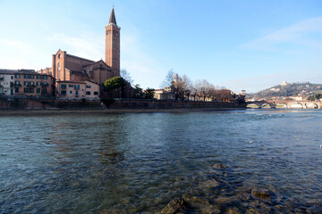 Fototapeta premium Verona is one of the most romantic cities in Italy. From the Adige river you can see the hill and cross the Stone bridge, one of the oldest in Veneto.