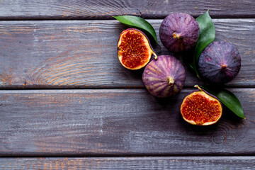Fresh purple fig fruit with leaves. Close up