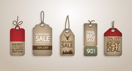 Vector realistick set of red Christmas sale paper tags with different shapes and hand drawn elements in red color hanging with discount text for christmas holiday shopping promotion. © ku4erashka