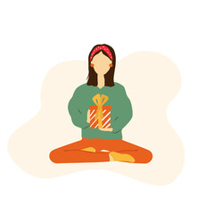 Woman sitting on the floor with gift 