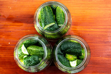 pickled cucumbers with mustard in a jar. Appetizer for gourmets.