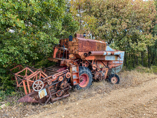 combine harvester in field