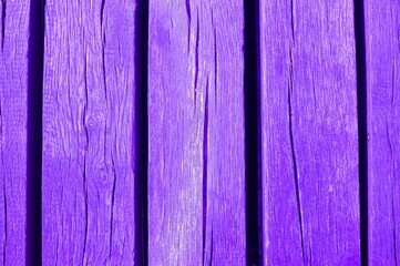 Naklejka premium Purple wooden texture background. Horizontal top view. 