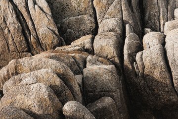 Stones on the beach, the coastline of the sea.
