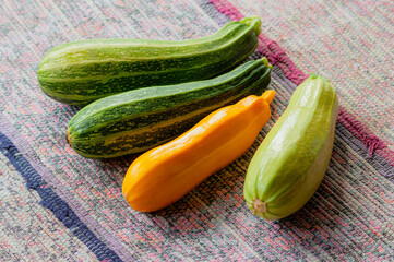 close-up of courgettes of different kinds on the table.