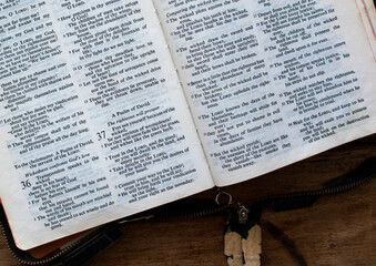 Holy Bible isolated on old vintage wooden table