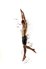 Freedom. Caucasian professional sportsman, swimmer training isolated on white studio background....