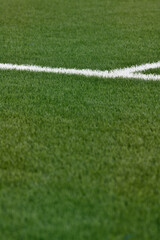 Green football field with nobody