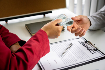 Bribery and corruption concept, businesswoman, give money, banknotes Dollar bribe male businessmen...