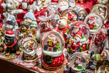 Traditional Souvenirs snow globes and toys Santa Claus Dolls At European Winter Christmas Market Souvenir