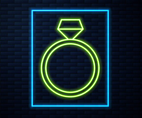 Glowing neon line Diamond engagement ring icon isolated on brick wall background. Vector.