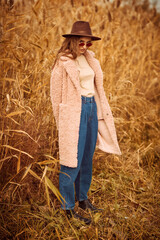 young woman in trendy coat