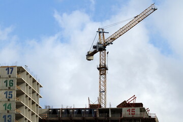 Fototapeta na wymiar high-rise cranes designed for the construction of high-rise buildings