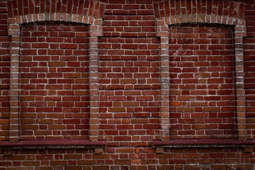 red painted brick wall background.
