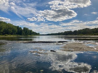 river and cloud reflections