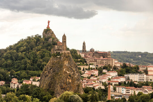 Le Puy-en-Velay, France. Views of the Cathedral of Notre-Dame, the Saint Michel d'Aiguilhe Chapel, and the statue of Notre-Dame de France