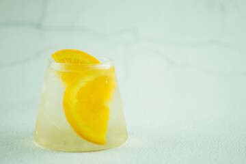Cool water with fresh orange slice