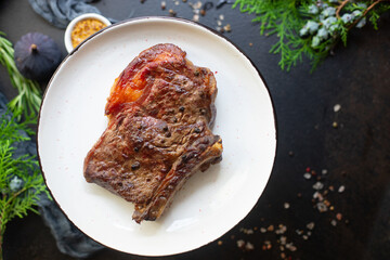 beef steak ribeye bbq grilled veal meat fried rare or medium tasty top view copy space for text food background rustic