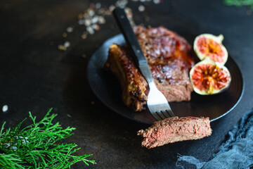 beef steak ribeye bbq grilled veal meat fried rare or medium tasty top view copy space for text food background rustic