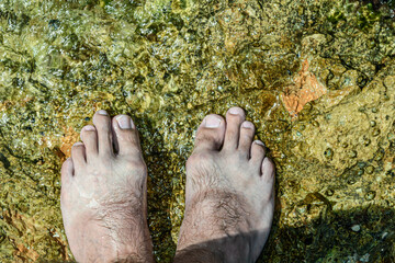 Foot in the shallow water