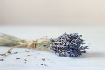 Sprig of dried lavender on a wooden table