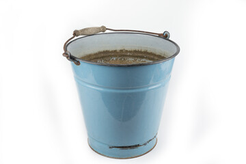 Old retro enamel bucket on a white