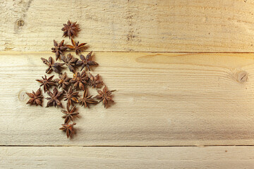 Christmas anise  spices on wood background - Decoration elements