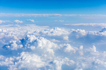 Sky cloudscape.Blue sky and white clouds on a sunny day.Aerial view.