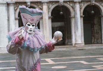Colorful carnival masks at a traditional festival in Venice, Italy