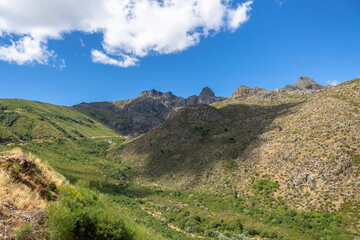 Fototapeta na wymiar View from the top of the mountains of the Serra da Estrela natural park, Star Mountain Range, glacier valley and mountain landscape