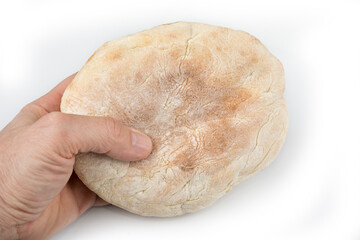 Traditional home bake bread lepinja on a white