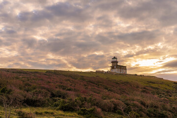 Fototapeta na wymiar Lighthouse Print: Fine Art Photo Print of Belle Tout Lighthouse at Sunset, East Sussex, UK