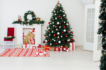 Christmas tree pine with fireplace interior of the house new year decor gifts vacation