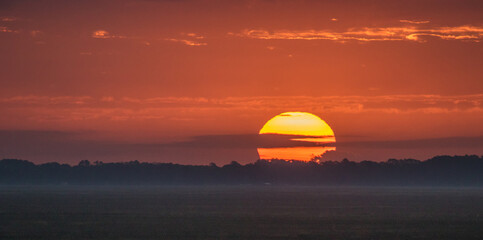 Fototapeta na wymiar Sunrise over the salt grass marsh near St Marys, Georgia
