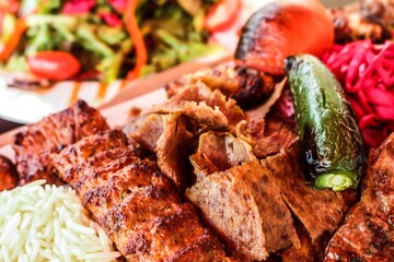 A dish of different types of Persian style meat