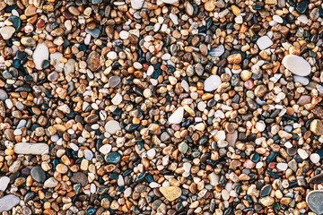 Pebbles beach stones background. Colorsful natural. Horizontal