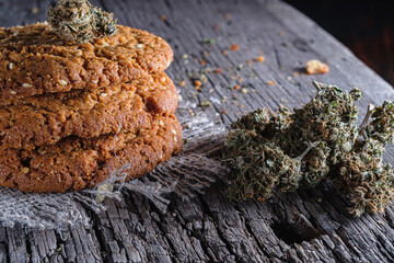 biscuits with hemp on an old wooden background close-up. rustic. Horizontal orientation.