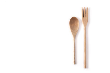 Wooden spoon and fork isolated on white background.Copy space