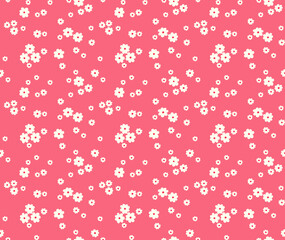Seamless floral pattern for design. Small white flowers. Pink background. Modern floral pattern. elegant template for fashion prints.