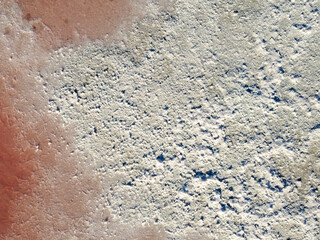 Background from salt formed as a result of drying of the pink lake.