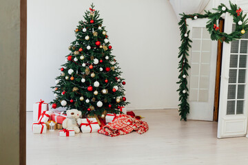 Christmas tree pine white interior room new year decor garland gifts postcard