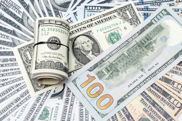 The U.S. dollars banknotes of the united States of America. The stack of money for the financial concept of earnings or business concept.