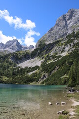 Hiking tour to Seebensee in the Austrian Alps between to Ehrwalder Alm and Coburger Hütte 