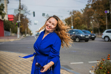 Happy smiling beautiful plus size model . Portrait large girl smiling on a sunny day with good mood, Photo of new age standard of beauty