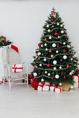 Christmas tree pine interior of the house new year decoration garland gifts