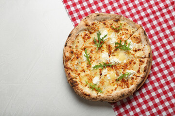 Tasty cheese pizza on white table, top view